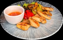 Куриное бедро с овощами